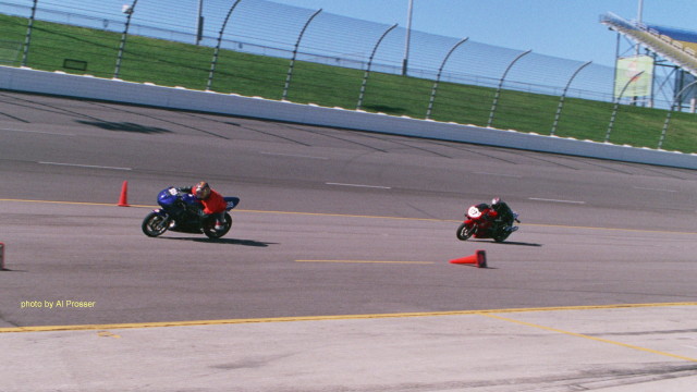 Chase Rider showing the way into turn one