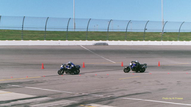 Riders entering turn one, inside shot